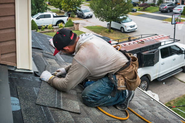 Professional Roofing technician working in Portland, ME